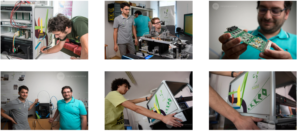 Cicci Research staff assembling laboratory instruments and electronic systems