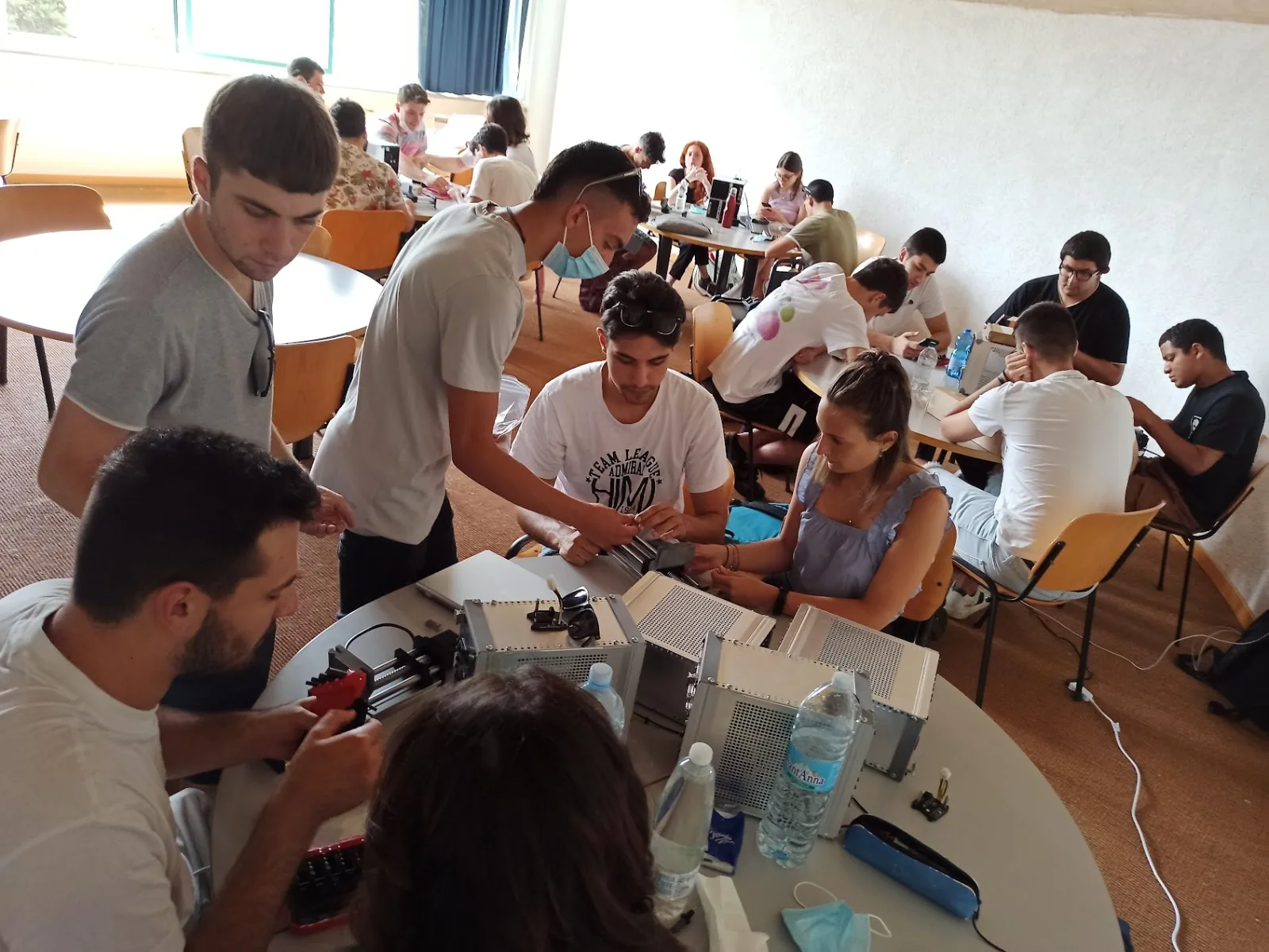 Students assembling and testing ARKEO-related hardware modules during training